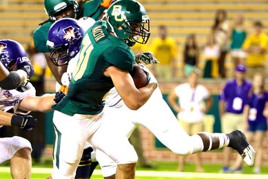 Homeless a year ago, RB scores winning TD