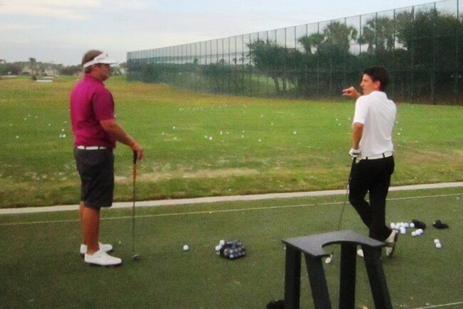 _2hungarysdanielkovariwhitechattingitupwithusascoryproveauxafterthesecondroundontherange12-21-11_crop_exact
