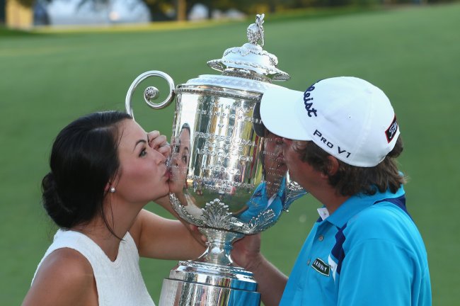 Jason Dufner patting wifes ass after winning PGA Championship r/g image photo