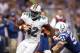 INDIANAPOLIS, IN - NOVEMBER 04: Charles Clay #42 of the Miami Dolphins runs toward the end zone on a 31-yard touchdown reception ahead of Pat Angerer #51 of the Indianapolis Colts during the game at Lucas Oil Stadium on November 4, 2012 in Indianapolis, I
