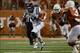 Sep 14, 2013; Austin, TX, USA; Mississippi Rebels quarterback Bo Wallace (14) runs the ball against the Texas Longhorns during the second half at Darrell K Royal-Texas Memorial Stadium. Ole Miss beat Texas 44-23. Mandatory Credit: Brendan Maloney-USA TODA