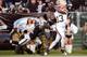 OAKLAND, CA - DECEMBER 02: Josh Gordon #13 of the Cleveland Browns catches a forty-four yard touchdown pass over Ron Bartell #21 of the Oakland Raiders during the second quarter at Oakland-Alameda County Coliseum on December 2, 2012 in Oakland, Californi