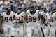 HOUSTON, TX - SEPTEMBER 15: J.J. Watt #99 of the Houston Texans and the defensive line during a break at Reliant Stadium on September 15, 2013 in Houston, Texas. (Photo by Bob Levey/Getty Images)