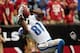 Sep 15, 2013; Phoenix, AZ, USA; Detroit Lions wide receiver Calvin Johnson (81) completes a pass for a touchdown in the second quarter against the Arizona Cardinals at University of Phoenix Stadium. Mandatory Credit: Jennifer Hilderbrand-USA TODAY Sports