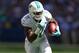INDIANAPOLIS, IN - SEPTEMBER 15: Mike Wallace #11 of the Miami Dolphins runs for a touchdown during the NFL game against the Indianapolis Colts at Lucas Oil Stadium on September 15, 2013 in Indianapolis, Indiana. (Photo by Andy Lyons/Getty Images)