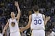 April 09, 2013; Oakland, CA, USA; Golden State Warriors point guard Stephen Curry (30) celebrates with shooting guard Klay Thompson (11) after scoring a three point basket against the Minnesota Timberwolves during the third quarter at Oracle Arena. The Go