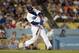 LOS ANGELES, CA - AUGUST 30: Hanley Ramirez #13 of the Los Angeles Dodgers hits a double that scores two runs in the seventh inning against the San Diego Padres at Dodger Stadium on August 30, 2013 in Los Angeles, California. (Photo by Jeff Gross/Getty