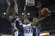 April 07, 2013; Sacramento, CA, USA; Sacramento Kings point guard Isaiah Thomas (22) goes up for the basket between Memphis Grizzlies power forward Ed Davis (32) and shooting guard Tony Allen (9) during the third quarter at Sleep Train Arena. The Grizzlie