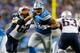 DETROIT, MI - AUGUST 22: Ndamukong Suh #90 of the Detroit Lions tries to get through the blocks of Ryan Wendell #62 and Dan Connolly #63 of the New England Patriots during the first quarter during a pre season game at Ford Field on August 22, 2013 in Detr