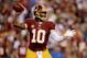 LANDOVER, MD - SEPTEMBER 09: Quarterback Robert Griffin III #10 of the Washington Redskins looks to pass in the first quarter agianst the Philadelphia Eagles at FedExField on September 9, 2013 in Landover, Maryland. (Photo by Patrick Smith/Getty Images)