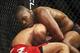Dec 10, 2011; Toronto, ON, Canada; UFC fighter Jon Jones (top) against fighter Lyoto Machida during a light heavyweight bout at UFC 140 at the Air Canada Centre. Mandatory Credit: Tom Szczerbowski-USA TODAY Sports