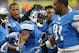 DETROIT, MI - SEPTEMBER 08: Reggie Bush #21 of the Detroit Lions celebrates with his teammates after running 77 yards for a third quarter touchdown during the game against the Minnesota Vikings at Ford Field on September 8, 2013 in Detroit, Michigan. (Ph