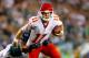 PHILADELPHIA, PA - SEPTEMBER 19: Alex Smith #11 of the Kansas City Chiefs tries to avoid being sacked by Nate Allen #29 of the Philadelphia Eagles in the first quarter at Lincoln Financial Field on September 19, 2013 in Philadelphia, Pennsylvania. (Pho