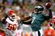 PHILADELPHIA, PA - SEPTEMBER 19: Michael Vick #7 of the Philadelphia Eagles is pressured by Justin Houston #50 of the Kansas City Chiefs on September 19, 2013 at Lincoln Financial Field in Philadelphia, Pennslyvania. The Kansas City Chiefs defeated the
