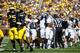 Sep 14, 2013; Ann Arbor, MI, USA; Akron Zips offensive linesman Henry Orelus (55) celebrates after recovering a fumble by Michigan Wolverines quarterback Devin Gardner (98) in the second quarter at Michigan Stadium. Mandatory Credit: Rick Osentoski-USA TO