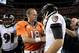 Sep 5, 2013; Denver, CO, USA; Denver Broncos quarterback Peyton Manning (18) greats Baltimore Ravens quarterback Joe Flacco (5) following the end of the game at Sports Authority Field at Mile High. The Broncos defeated the Ravens 49-27. Mandatory Credit: