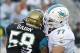 Aug 9, 2013; Jacksonville, FL, USA; Miami Dolphins tackle Tyson Clabo (77) blocks Jacksonville Jaguars defensive end Jason Babin (58) during the first quarter at EverBank Field. Mandatory Credit: Kim Klement-USA TODAY Sports