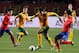 GYEONGGI-DO, SOUTH KOREA - NOVEMBER 14: Tom Rogic of Australia tussles for possession with Koh Myung-Jin of South Korea during the friendly match between Australia and South Korea on November 14, 2012 in Gyeonggi-do, South Korea. (Photo by Chung Sung-Ju