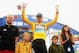 KNOWSLEY, ENGLAND - SEPTEMBER 17: Sir Bradley Wiggins of Great Britain and SKY Procycling celebrates taking the race leaders gold jersey after winning stage three of the Tour of Britain, a 16km individual time trial in Knowsley Safari Park, on September
