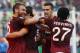ROME, ITALY - SEPTEMBER 01: Adem Ljajic (L-2nd) with his teammates of AS Roma celebrates after scoring the third team's goal during the Serie A match between AS Roma and Hellas Verona FC at Stadio Olimpico at Stadio Olimpico on September 1, 2013 in Rome,
