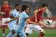 ROME, ITALY - APRIL 08: Alvaro Gonzalez (L) of S.S. Lazio competes for the ball with Marquinho of AS Roma during the Serie A match between AS Roma and S.S. Lazio at Stadio Olimpico on April 8, 2013 in Rome, Italy. (Photo by Paolo Bruno/Getty Images)