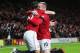 MANCHESTER, ENGLAND - NOVEMBER 28: Robin van Persie of Manchester United (L) celebrates with Wayne Rooney of Manchester United as he scores their first goal during the Barclays Premier League match between Manchester United and West Ham United at Old Tra