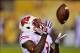 Sep 14, 2013; Tempe, AZ, USA; Wisconsin Badgers wide receiver Kenzel Doe (3) catches a punt during the second half against the Arizona State Sun Devils at Sun Devil Stadium. Mandatory Credit: Matt Kartozian-USA TODAY Sports