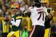GREEN BAY, WI - SEPTEMBER 13: Quarterback Aaron Rodgers #12 of the Green Bay Packers looks to pass against the Chicago Bears in the first quarter at Lambeau Field on September 13, 2012 in Green Bay, Wisconsin. (Photo by Jonathan Daniel/Getty Images)