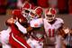 RALEIGH, NC - SEPTEMBER 19: Garry Peters #26 of the Clemson Tigers tries to stop Shadrach Thornton #10 of the North Carolina State Wolfpack during their game at Carter-Finley Stadium on September 19, 2013 in Raleigh, North Carolina. (Photo by Streeter L