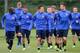 ST ALBANS, ENGLAND - SEPTEMBER 17: Laurent Koscielny,Olivier Giroud and Bacary Sagna of Arsenal warm up during an Arsenal training session at London Colney on September 17, 2013 in St Albans, England. (Photo by Jamie McDonald/Getty Images)