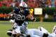 AUBURN, AL - SEPTEMBER 14: Corey Grant #20 of the Auburn Tigers is tackled by Deontae Skinner #11 of the Mississippi State Bulldogs at Jordan-Hare Stadium on September 14, 2013 in Auburn, Alabama. (Photo by Kevin C. Cox/Getty Images)