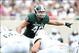 Sep 7, 2013; East Lansing, MI, USA; Michigan State Spartans linebacker Max Bullough (40) points to South Florida Bulls offense during the first half at Spartan Stadium. Mandatory Credit: Mike Carter-USA TODAY Sports