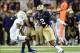 Aug 31, 2013; Seattle, WA, USA; Washington Huskies wide receiver Kasen Williams (2) carries the ball past Boise State Broncos cornerback Donte Deayon (5) during the 2nd half at Husky Stadium. Washington defeated Boise State 38-6. Mandatory Credit: Steven