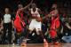 NEW YORK, NY - APRIL 17: Playing in his first game as a New York Knick, Earl Barron #42 carries the ball against the Atlanta Hawks at Madison Square Garden on April 17, 2013 in New York City. NOTE TO USER: User expressly acknowledges and agrees that, by d