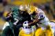 BATON ROUGE, LA - SEPTEMBER 07: Jordan Howard #7 of the UAB Blazers is brought down Rickey Jefferson #29 of the LSU Tigers during a game at Tiger Stadium on September 7, 2013 in Baton Rouge, Louisiana. (Photo by Stacy Revere/Getty Images)