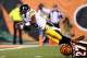 CINCINNATI, OH - SEPTEMBER 16: Wide receiver Emmanuel Sanders #88 of the Pittsburgh Steelers is tackled by cornerback Dre Kirkpatrick #27 of the Cincinnati Bengals on the one-yard line after a 43-yard gain in the second quarter at Paul Brown Stadium on S