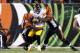 CINCINNATI, OH - SEPTEMBER 16: Wallace Gilberry #95 and Geno Atkins #97 of the Cincinnati Bengals combine to sack Ben Roethlisberger #7 of the Pittsburgh Steelers during the third quarter on September 16, 2013 at Paul Brown Stadium on September 16, 2013