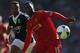 LIVERPOOL, ENGLAND - SEPTEMBER 21: Daniel Sturridge of Liverpool in action with Nathaniel Clyne of Southampton during the Barclays Premier League match between Liverpool and Southampton at Anfield on September 21, 2013 in Liverpool, England. (Photo by Cl