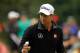 Sep 21, 2013; Atlanta, GA, USA; Adam Scott waves to fans after sinking a putt on the second hole during the third round of the Tour Championship at East Lake Golf Club. Mandatory Credit: Brett Davis-USA TODAY Sports