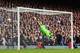 LONDON, ENGLAND - SEPTEMBER 21: Leighton Baines (unseen) of Everton scores from a freekick past Jussi Jaaskelainen the West Ham United goalkeeper during the Barclays Premier League match between West Ham United and Everton at the Boleyn Ground on Septemb