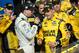 Sep 15, 2013; Joliet, IL, USA; NASCAR Sprint Cup Series driver Matt Kenseth (right) celebrates in victory lane with teammate Kyle Busch (left) after winning the Geico 400 at Chicagoland Speedway. Mandatory Credit: Rob Grabowski-USA TODAY Sports