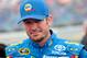Sep 15, 2013; Joliet, IL, USA; NASCAR Sprint Cup Series driver Martin Truex Jr. (56) before the Geico 400 at Chicagoland Speedway. Mandatory Credit: Rob Grabowski-USA TODAY Sports