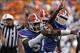 Sep 21, 2013; Gainesville, FL, USA; Florida Gators linebacker Michael Taylor (51) grabs the fumble during the first half against the Tennessee Volunteers at Ben Hill Griffin Stadium. Mandatory Credit: Kim Klement-USA TODAY Sports