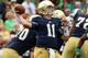 SOUTH BEND, IN - SEPTEMBER 21: Tommy Rees #11 of the Notre Dame Fighting Irish passes against the Michigan State Spartans at Notre Dame Stadium on September 21, 2013 in South Bend, Indiana.(Photo by Jonathan Daniel/Getty Images)