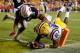 BATON ROUGE, LA - SEPTEMBER 21: Jarvis Landry #80 of the LSU Tigers dives for a touchdown after avoiding a tackle by Ryan White #19 of the Auburn Tigers at Tiger Stadium on September 21, 2013 in Baton Rouge, Louisiana. (Photo by Chris Graythen/Getty Ima