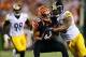 Sep 16, 2013; Cincinnati, OH, USA; Cincinnati Bengals tight end Tyler Eifert (85) is tackled by Pittsburgh Steelers outside linebacker LaMarr Woodley (56) during the second quarter at Paul Brown Stadium. Mandatory Credit: Andrew Weber-USA TODAY Sports