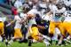 Sep 21, 2013; University Park, PA, USA; Kent State Golden Flashes quarterback David Fisher (7) gets tackled by Penn State Nittany Lions defensive tackle DaQuan Jones (91) at Beaver Stadium. Mandatory Credit: Evan Habeeb-USA TODAY Sports