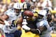 PITTSBURGH, PA - SEPTEMBER 08: Isaac Redman #33 of the Pittsburgh Steelers fumbles the ball in the first half against the Tennessee Titans during the game on September 8, 2013 at Heinz Field in Pittsburgh, Pennsylvania. (Photo by Justin K. Aller/Getty Ima