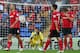 CARDIFF, WALES - SEPTEMBER 22: David Marshall (2L) the goalkeeper of Cardiff City is left distraught after conceding a last minute goal scored by Paulinho of Tottenham Hotspur during the Barclays Premier League match between Cardiff City and Tottenham Hot