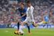 MADRID, SPAIN - SEPTEMBER 22: Cristiano Ronaldo (R) shoots past Pedro Mosquera Getafe during the La Liga match between Real Madrid and Getafe at the Bernabeu on September 22, 2013 in Madrid, Spain. (Photo by Denis Doyle/Getty Images)